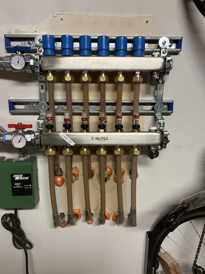 Plumber performing Gas Line Installation at a residential property in Trumbull